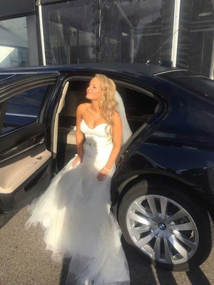 Love Limo Pic 2 - Bride enjoys the sunshine existing our BMW Limo