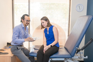 Carlisle Podiatry Pic 5 - Josh with a Patient