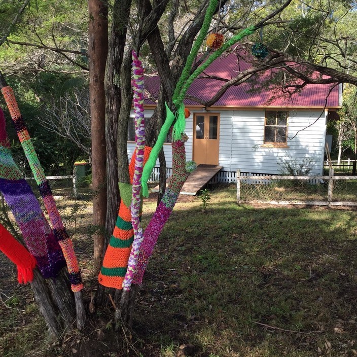 Playing With Possibilities Pic 1 - The Tree House is located on the bend of the road near the Cub Scout Hall the brightly colored knitted tree will help you find us