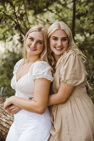 Joanna Kate Photography Pic 2 - Two teenage sisters hugging during a family photo shoot in Ferny Hills Brisbane