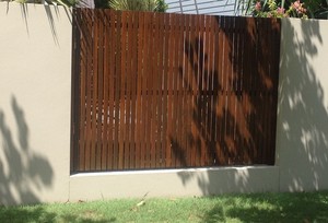 Fence and Garden Sunshine Coast Pic 3 - Block fence with vertical timber infill