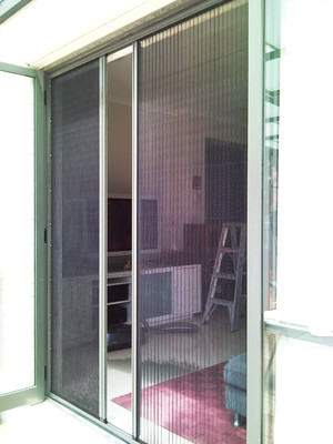 Flydoor Flyscreens Pic 2 - Pleated style Flyscreen doors