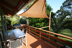 Warriwillah Cottages Pic 2 - relax on the verandah