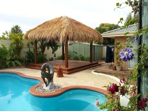 Huts and Decks WA Pic 4 - Beautiful Balinese style huts can transform a pool area into a tropical oasis