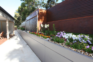 Landscape Tanks Pic 5 - Retaining wall and water feature all storing rain water