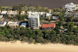 84 The Spit Holiday Apartments Pic 3 - Aerial view of 84 The Spit from above the beach