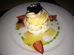 Dundee's Restaurant On The Waterfront Pic 2 - Marshmallow Pavlova blueberry compote passionfruit syrup Sublime