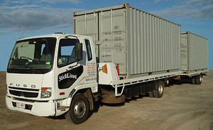 StickLizard Transport Pic 2 - We can transport 2 shipping containers at a time with truck and trailer