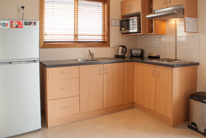 Port Vincent Caravan Park And Seaside Cabins Pic 3 - All cabins have full kitchen facilities