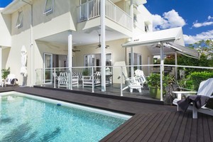 Deck Solutions Gold Coast Pic 5 - Pool deck extension to surround pool Glass pool fencing panels replaced their old metal fencing Ormeau QLD