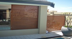 FBL Fencing and Gates Pic 2 - Aluminum Slat Wood look but plenty of colours available