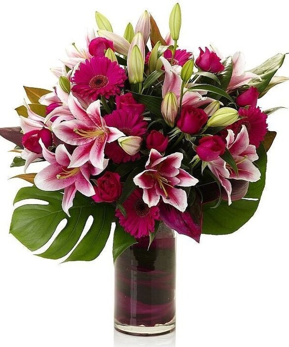 Aarvis flowers Pic 2 - A beautiful collection of Pink Roses Pink Lilies Pink Gerbera in Vase This arrangement is the perfect choice for any occasion