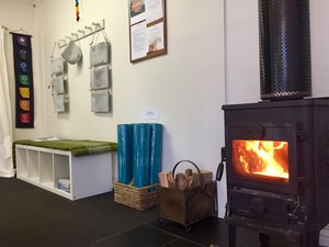 Calm Heart Yoga Pic 4 - Warm and cosy with the pot belly fire going at Calm Heart Yoga Meditation Studio