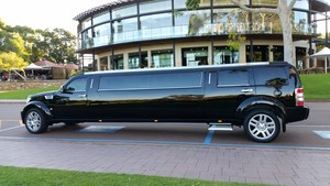 Bling Limousines Pic 5 - Black Dodge Nitro Limousine 10 passengers