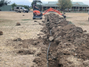 Brunt's Contracting Pic 2 - Trenching Poly pipe Laying