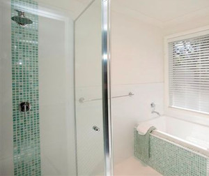 Love & Adorn Interiors Pic 4 - green mosaic main bathroom