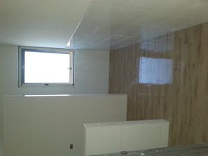 Ed's Tiling Services Pic 2 - Timber look floor tiles and white 1200mm high wall tiles