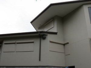 Beaches Outdoor Living Pic 5 - Bushfire rated roller shutters colourmatched to paintwork