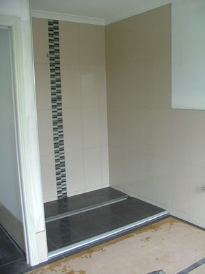 Macedon Ranges Tiling Services Pic 3 - modern shower with vertical border and new shower drainage system