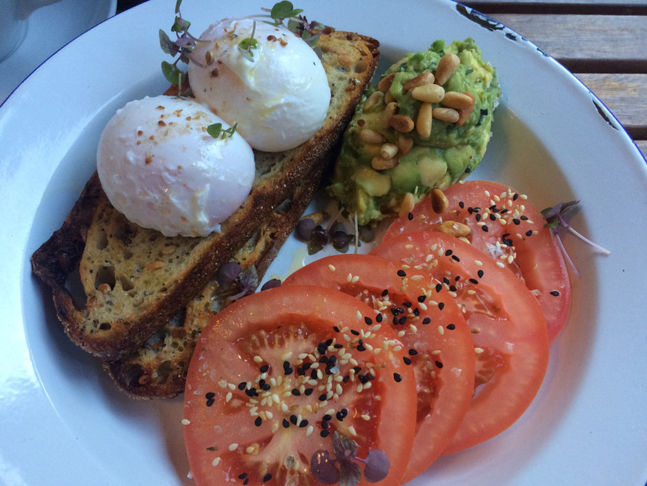 Salvage Coffee Pic 2 - Poached eggs on rye with avo smash tomatoes