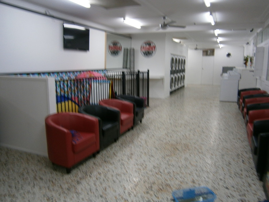 The Laundry Lounge Coin Laundry Pic 2 - Kid Friendly and secure area european tiled floors