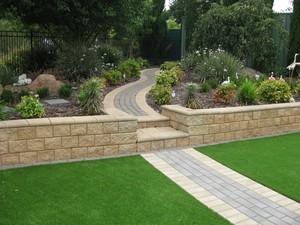 Complete Landscape & Garden Service Pic 2 - Lawn care retaining walls