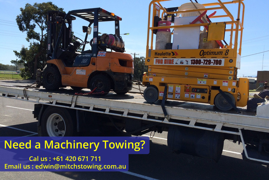 Mitch's Car Removals and Towing Pic 1 - Machinery Towing TOWING We are experts at loading transporting and unloading your valuable machinery