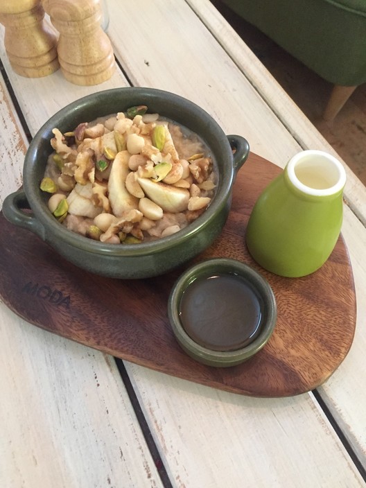 House of Hygge Cafe Pic 1 - Chef made Hot Gourmet Breakfast Menu Banana Maccadamia Nut and Cinnamon Porridge