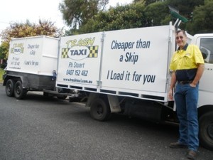 Trash Taxi Pic 2 - Stuart with the Trash Taxi truck and trailer