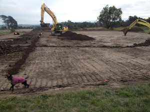 S&M Notley Excavations Pic 3 - a 60x40 horse arena being built Laying ag pipes down