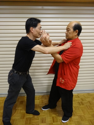 Tom Lo Kung Fu Pic 2 - Master Lo sparring with Sifu Christopher Leung