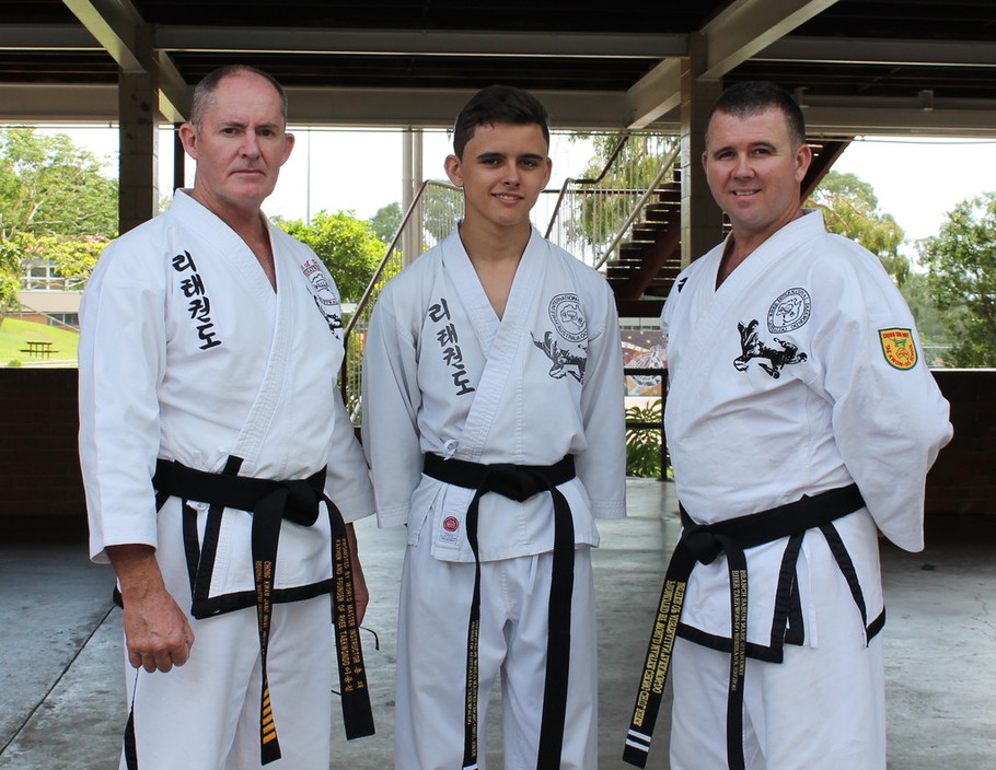 Rhee Taekwondo Jindalee Pic 1 - From Left to Right Master Nigel 6th Dan Regional Instructor Yu Dan Ja Sam 1st Dan Sabum Nim Mark 2nd Dan Branch Instructor