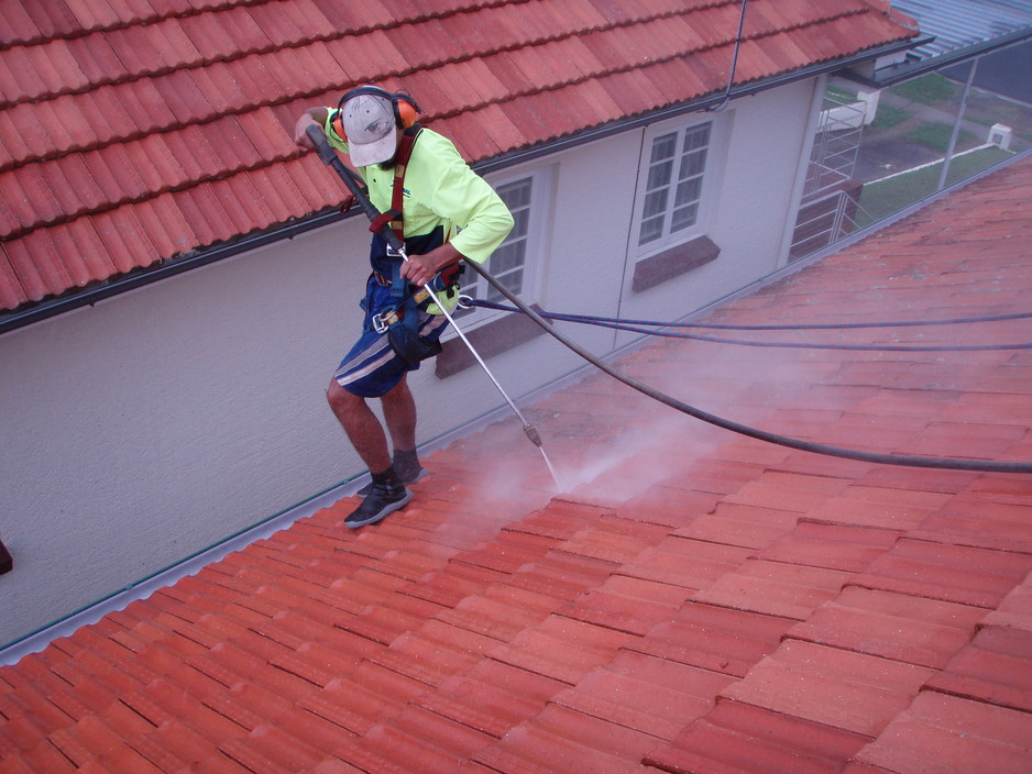 External Cleaners Pic 1 - terracotta roof cleaning the highly visable nose without pushing water into the roof