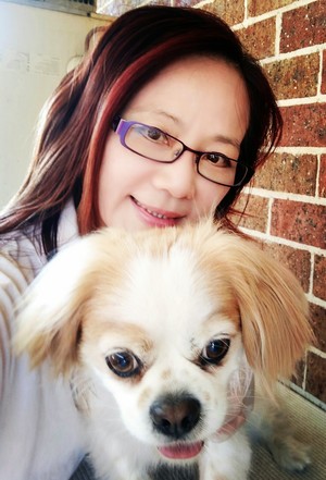 Lush Pet Care Pic 3 - Cassandra with Preston a gorgeous maltese cross posing for a pic after his grooming