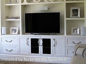 Nicks Media Systems Pic 3 - A smart TV speakers in a cabinet