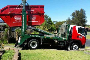 Matt's Skip Bins Pic 2 - Driver Mick collecting one of our popular 10 cubic metre bins