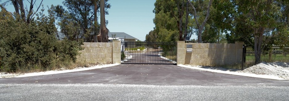 Merger Contracting Pty Ltd Pic 1 - Red Asphalt driveway