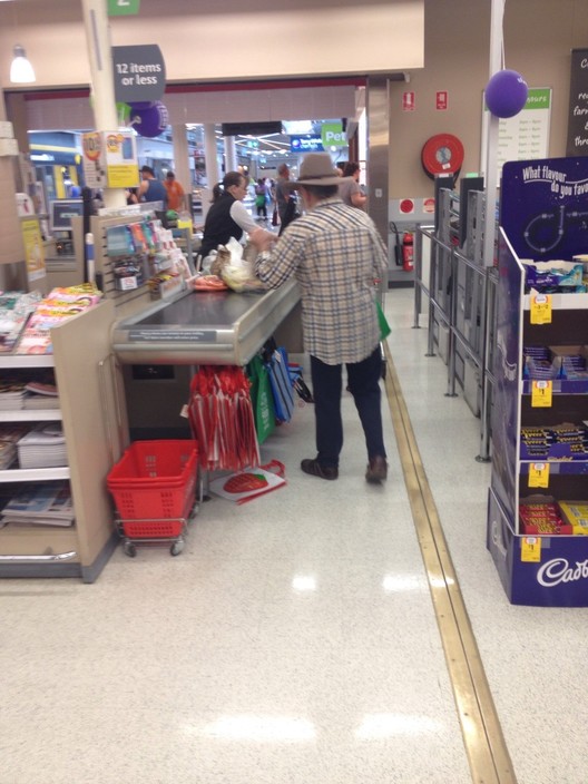 Coles Pic 1 - This guy wasnt turned away despite having literally about 40 items Not sure why they bother with the 12 or less sign