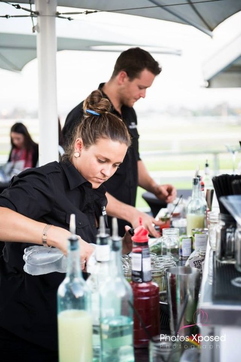 Steve the Bartender Pic 1 - Steve the Bartender team mixing up cocktails at Morphettville Racecourse in Adelaide