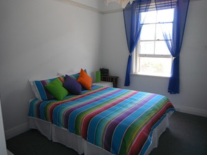 Stockton Beach House Pic 5 - 2nd Bedroom with Queen Bed