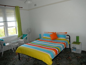 Stockton Beach House Pic 3 - Main bedroom window looks out onto Mitchell St and across to Stockton Beach