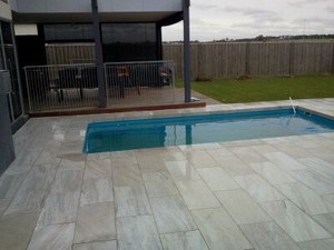 Ormescapes Landscape Construction Pic 5 - A new pool with white granite paving