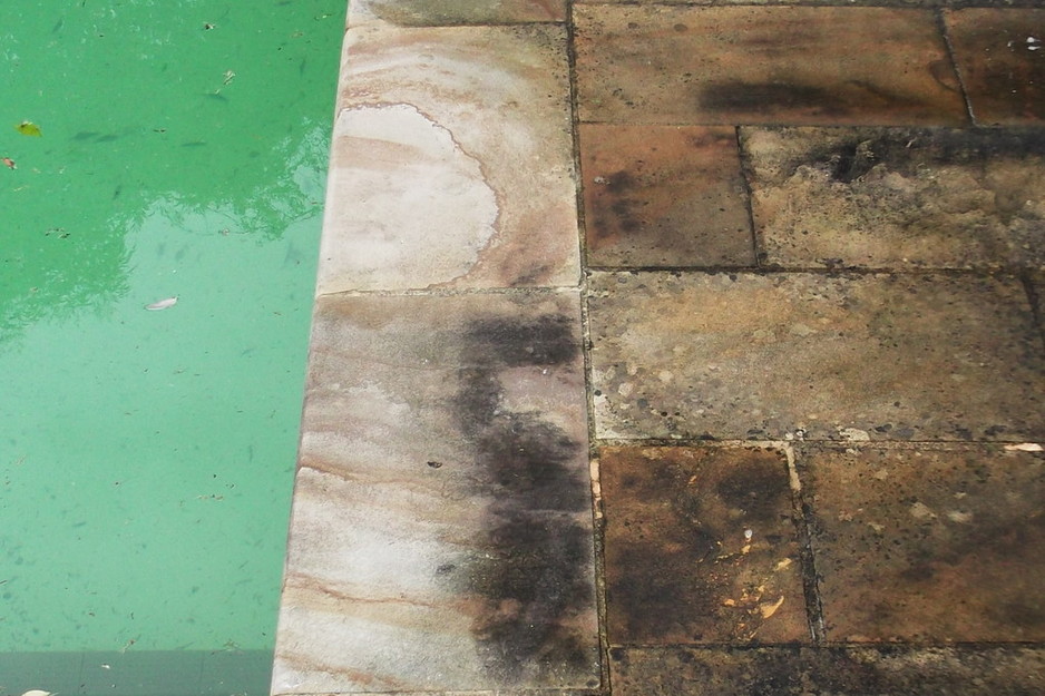 Mighty Powerwash Pic 1 - Poolside paving before