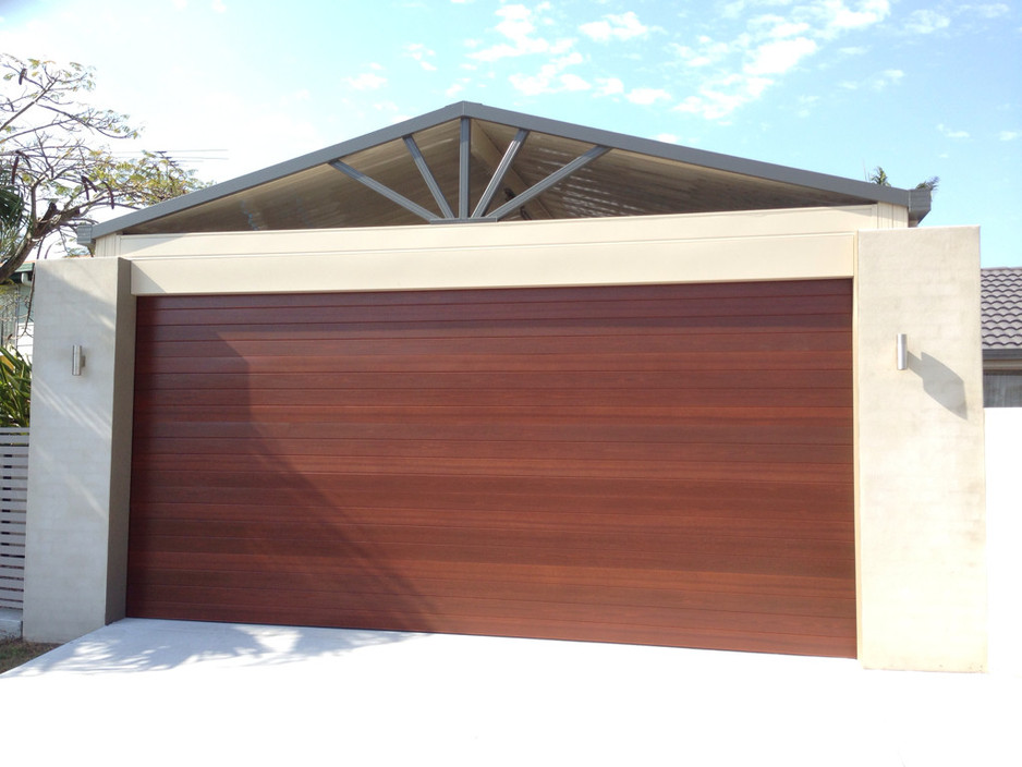 100% Garage Doors Pic 1 - BD Panelift with Timber Coat finish on Colorbond steel great look low maintenance