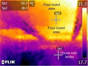 Housetop Roof Restoration and Insulation Pic 2 - A thermal image taken under a house showing heat movement through the uninsulated floorboards