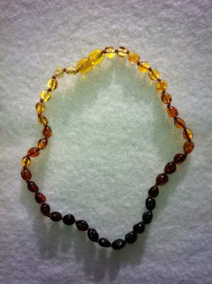 Bibs and Pieces Pic 4 - Amber teething necklace Olyve Rainbow