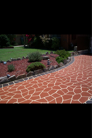 Ideal Decorative Coatings Pic 5 - Michinbury spray on paving Base coat Biege Top coat Terracotta Border Bushrock Charcoal Stencil Bushrock