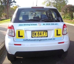 Alex Driving Lessons Pic 3 - Alex Driving School instructors car white Suzuki SX4