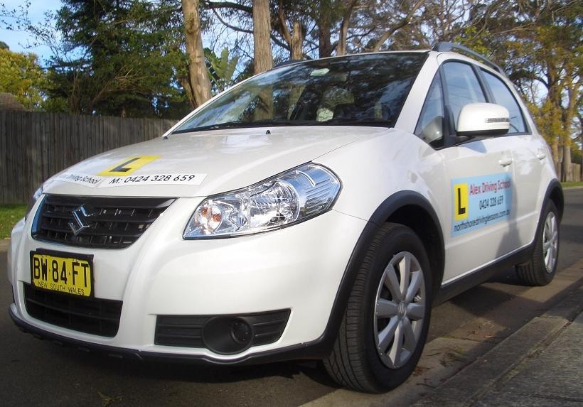 Alex Driving Lessons Pic 1 - Alex Driving School instructors car white Suzuki SX4