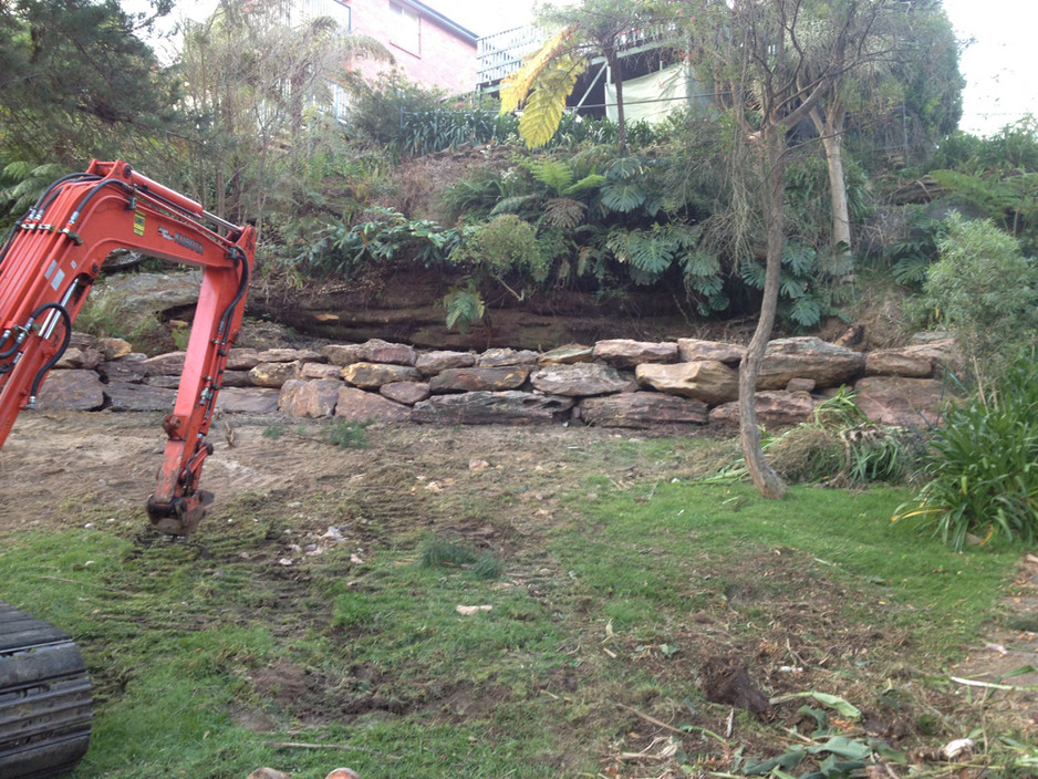 Wright Earthmoving nsw Pic 1 - Building rock retaining wall at Mt Karinggai